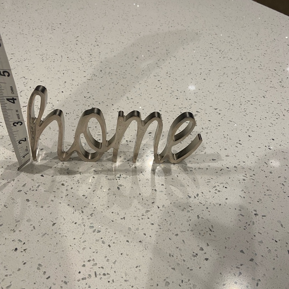 Silver cursive metal decor